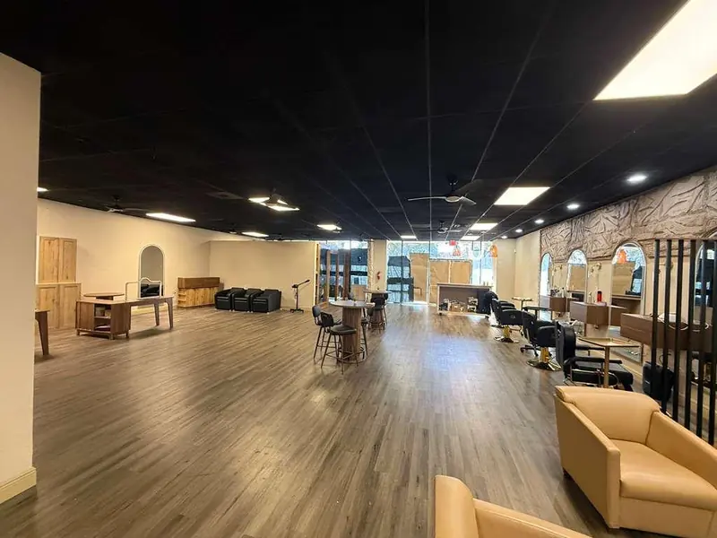 Hair salon commercial build-out in Orlando, Florida with styling stations and lounge seating